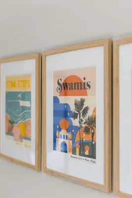 three framed prints of the same picture on a wall at Serena Encinitas by Coastline Vacation Rentals in Encinitas