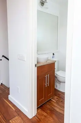 a bathroom with a sink and a toilet at Chic SD Basecamp - Walk to Downtown in San Diego