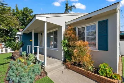 a small house with plants in front of it at The Mosaic by Coastline Vacation Rentals in San Diego
