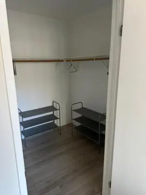 a room with two bunk beds and a wooden floor at Stylish Gaslamp 1BR Den Patio Walk Everywhere in San Diego