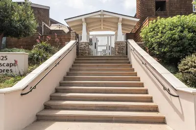 a set of stairs leading up to a house at Luxury Beachfront Townhouse with Breathtaking Views in Solana Beach