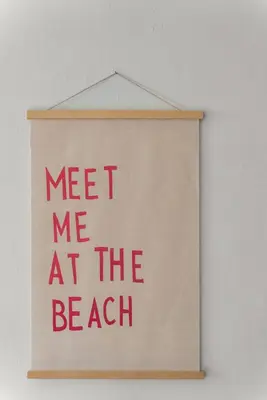 a sign with the words meet me at the beach at The Surf Shack by Coastline Vacation Rentals in San Diego