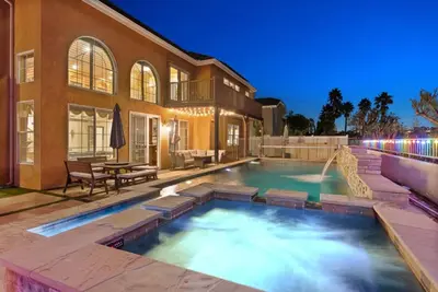 a swimming pool in the backyard of a house at Carmel Valley Villa by Coastline Vacation Rentals in San Diego