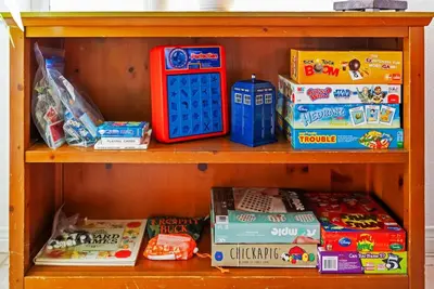 a wooden shelf filled with different types of food at Carmel Valley Villa by Coastline Vacation Rentals in San Diego