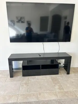 a black coffee table in front of a wall with a mirror at Beautiful Villa with Amazing 360 Mountain Views, Golfcourses close to Monserate Winery and I-15 in Fallbrook