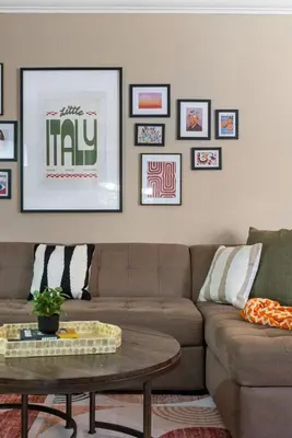 a living room with a couch and a table at La Dolce Vita by Coastline Vacation Rentals in San Diego