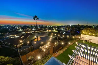 a view of a city at night with lights at The Lookout by Coastline Vacation Rentals in Chula Vista