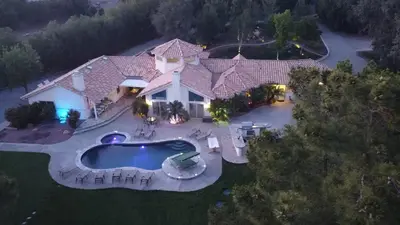 an aerial view of a house with a swimming pool at Villa La Cresta - 5 Acre Retreat in Murrieta