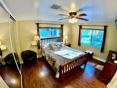 a bedroom with a bed and a ceiling fan at Villa La Cresta - 5 Acre Retreat in Murrieta