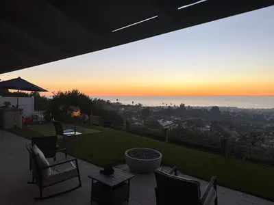 a view of the sunset from the roof of a house at Avenida Paradise! in San Clemente