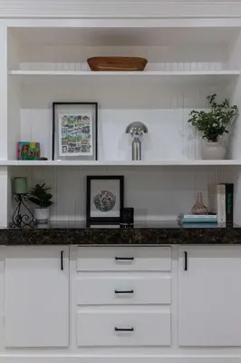 a kitchen with white cabinets and a counter top at Close to Balboa Park Central Villa in San Diego