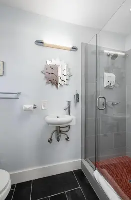 a bathroom with a sink and a shower at Ocean Beach Bungalow - Close To Beach in San Diego