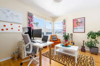 an office with a desk and a computer in a room at Ocean Beach Bungalow - Close To Beach in San Diego