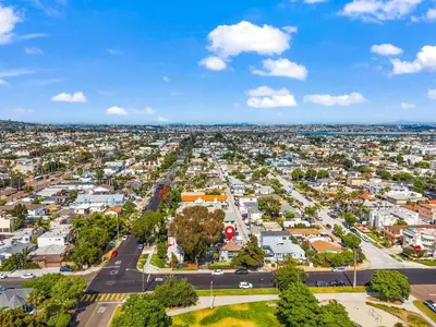 an aerial view of a city with houses at Vintage Surf Hut by Coastline Vacation Rentals in San Diego