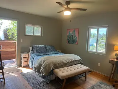 a bedroom with a bed and a ceiling fan at 2BR Cozy Quiet Getaway, Great Mattress in El Cajon