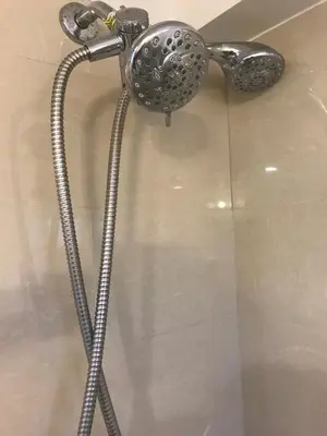 a shower in a bathroom with a shower head at La Jolla private Studio in San Diego