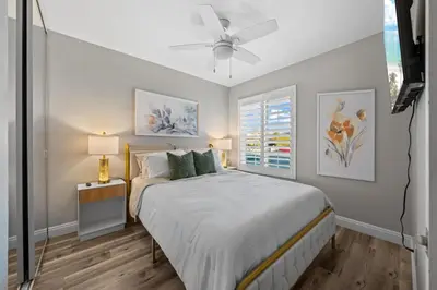 a bedroom with a bed and a ceiling fan at Entire Private Home with 3 Bedrooms 2 Bathrooms, Gated Yard, Garage, Hot Tub, 4-Beds, Golf, Mira Mesa, Available Now in San Diego