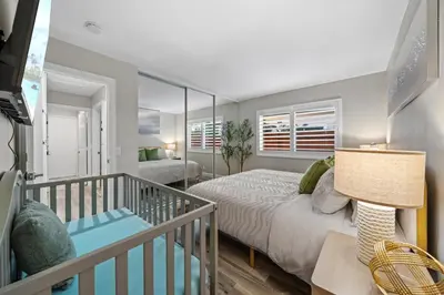 a bedroom with a bed and a balcony at Entire Private Home with 3 Bedrooms 2 Bathrooms, Gated Yard, Garage, Hot Tub, 4-Beds, Golf, Mira Mesa, Available Now in San Diego