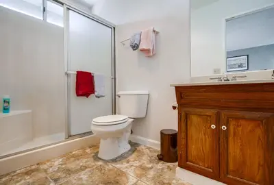 a bathroom with a toilet and a shower and a sink at Entire Private Home with 3 Bedrooms 2 Bathrooms, Ranch Style w Gated Yard near Beach, Available Now in Imperial Beach