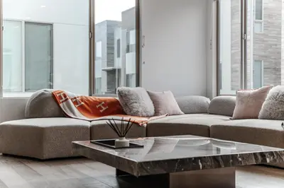 a living room with a couch and a coffee table at #Marbella Lane - Luxurious Coastal Haven Escape in Newport Beach