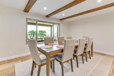 a dining room with a table and chairs at Game Room, Hot Tub and Views! Luxe Temecula Estate in Temecula
