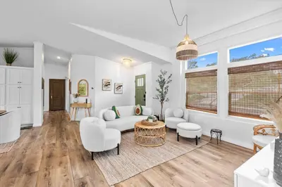 a living room with a couch and a table at Avocado Akres Awaits Near Monserate Winery in Fallbrook