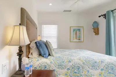 a bedroom with a bed and a lamp and a window at 4 Bdr 2 Bth in heart of Hilcrest 10 minutes from balboa park in San Diego