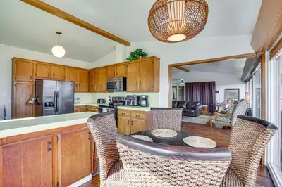 a kitchen with a table and chairs in a room at 474 Oasis w Amazing Views Huge Pool in La Mesa