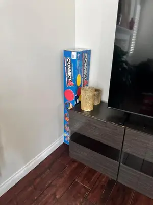 a box of cereal sitting next to a tv at Modern Family Oasis in San Jacinto