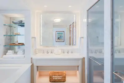 a bathroom with a sink and a shower at Surf & Sand Laguna Beach in Laguna Beach