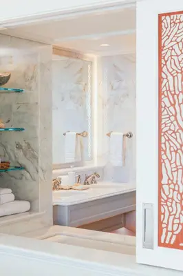 a bathroom with a sink and a mirror at Surf & Sand Laguna Beach in Laguna Beach
