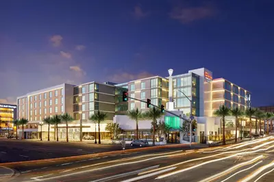 a rendering of a building on a street with a traffic light at Hilton Garden Inn San Diego Downtown/Bayside, CA in San Diego