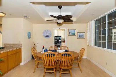 a dining room with a table and chairs at Rooftop Deck Spectacular Ocean View M-A in Oceanside
