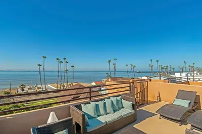 a living room with a view of the beach at Ocean View Steps to Beach M-C in Oceanside