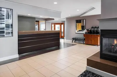 a lobby with a bar and a fireplace at Residence Inn San Diego Rancho Bernardo Scripps Poway in Sabre Springs