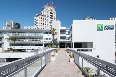 a walkway in the city with buildings at Holiday Inn Express - Downtown San Diego by IHG in San Diego