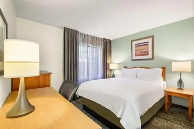 a hotel room with a bed and a window at Sonesta ES Suites San Diego - Rancho Bernardo in Rancho Bernardo