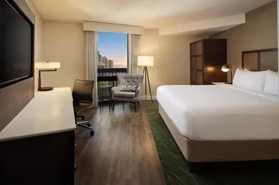 a hotel room with a bed and a television at The DEXTRO Little Italy, BW Premier Collection in San Diego