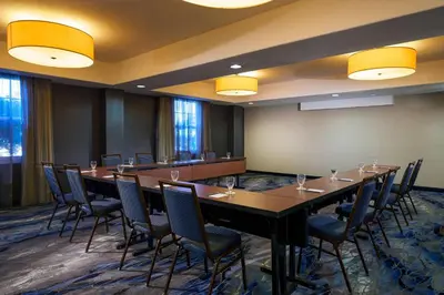 a conference room with a long table and chairs at Fairfield Inn & Suites San Diego Old Town in San Diego