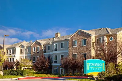a building with a sign in front of it at Staybridge Suites Irvine East/Lake Forest by IHG in Lake Forest