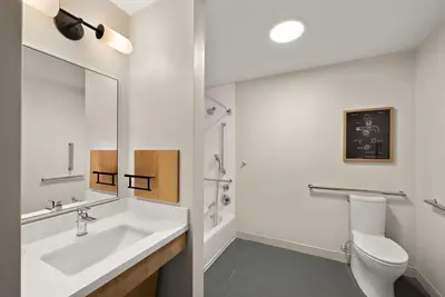 a bathroom with a sink and a toilet at Sonesta Simply Suites Irvine East Foothill in Lake Forest