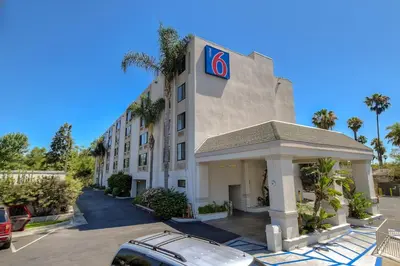 a hotel with a car parked in front of it at Motel 6-San Diego, CA - Hotel Circle - Mission Valley in San Diego