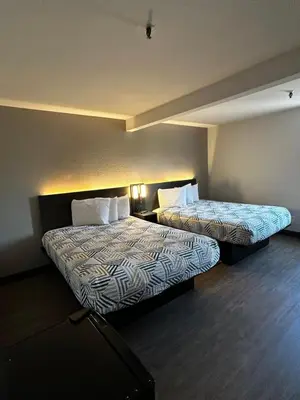 a hotel room with two beds in a room at Motel 6-San Diego, CA - Hotel Circle - Mission Valley in San Diego