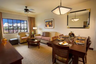 a living room with a dining table and a living room at Marbrisa Carlsbad Resort in Carlsbad