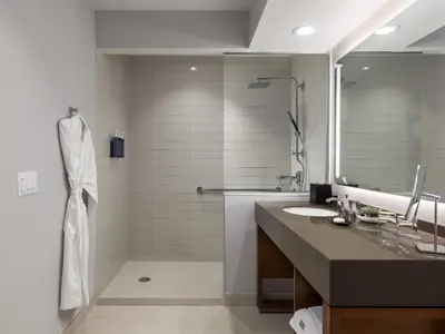 a bathroom with a sink and a large mirror at The Westin San Diego Bayview in San Diego