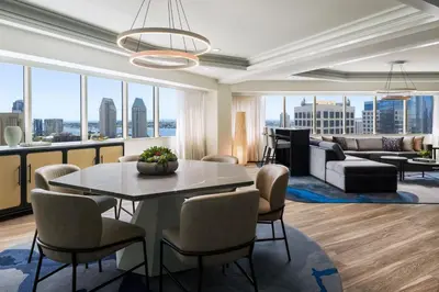 a living room with a table and chairs at The Westin San Diego Bayview in San Diego
