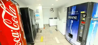 a coca cola vending machine and a soda machine at Motel 6 San Diego, CA Airport Harbor in San Diego