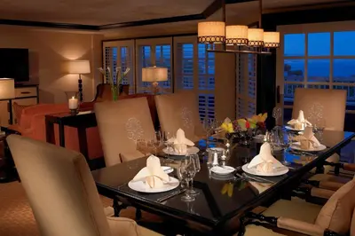 a dining room with a long table and chairs at Laguna Cliffs Marriott Resort & Spa in Dana Point
