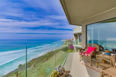 a balcony with a view of the ocean at Work Friendly Oceanfront SURF25 Condo in Solana Beach