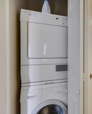 a white washer and dryer in a room at Work Friendly Oceanfront SURF25 Condo in Solana Beach